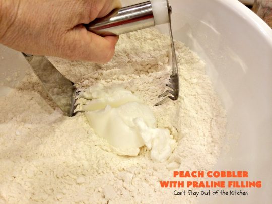 Peach Cobbler with Praline Filling | Can't Stay Out of the Kitchen | this luscious #peach #cobbler has #praline pie crust rolls on top. Absolutely divine! Perfect #dessert for summer.