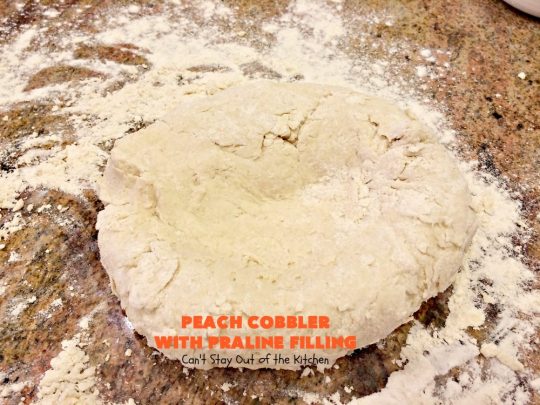 Peach Cobbler with Praline Filling | Can't Stay Out of the Kitchen | this luscious #peach #cobbler has #praline pie crust rolls on top. Absolutely divine! Perfect #dessert for summer.