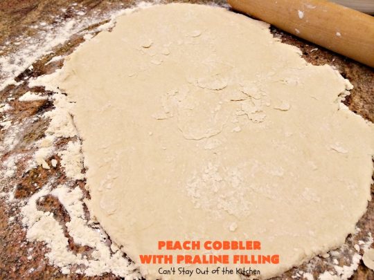 Peach Cobbler with Praline Filling | Can't Stay Out of the Kitchen | this luscious #peach #cobbler has #praline pie crust rolls on top. Absolutely divine! Perfect #dessert for summer.