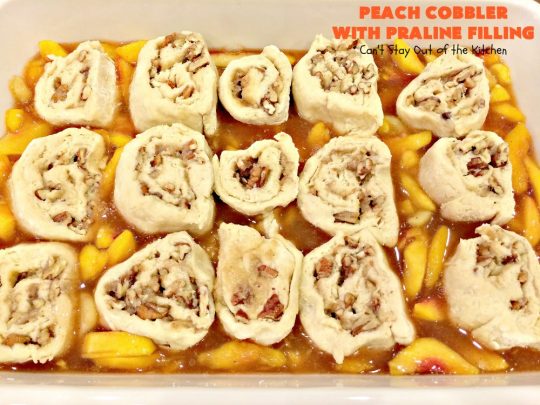 Peach Cobbler with Praline Filling | Can't Stay Out of the Kitchen | this luscious #peach #cobbler has #praline pie crust rolls on top. Absolutely divine! Perfect #dessert for summer.