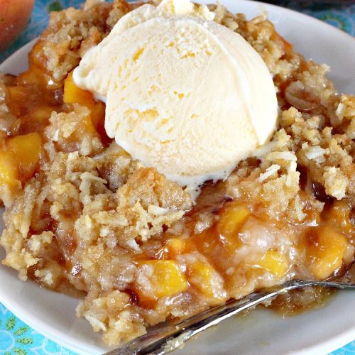 Peach Crisp | Can't Stay Out of the Kitchen | our company raved over this amazing #dessert. The streusel crust & topping is made with #coconut & it has an easy homemade #peach filling in the middle. It's the perfect dessert for summer #holidays, #BBQs & potlucks. #Father'sDay #FourthofJuly
