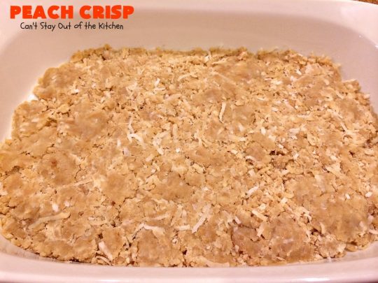 Peach Crisp | Can't Stay Out of the Kitchen | our company raved over this amazing #dessert. The streusel crust & topping is made with #coconut & it has an easy homemade #peach filling in the middle. It's the perfect dessert for summer #holidays, #BBQs & potlucks. #Father'sDay #FourthofJuly