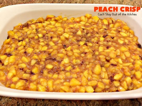 Peach Crisp | Can't Stay Out of the Kitchen | our company raved over this amazing #dessert. The streusel crust & topping is made with #coconut & it has an easy homemade #peach filling in the middle. It's the perfect dessert for summer #holidays, #BBQs & potlucks. #Father'sDay #FourthofJuly