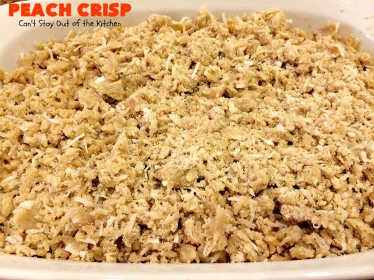 Peach Crisp | Can't Stay Out of the Kitchen | our company raved over this amazing #dessert. The streusel crust & topping is made with #coconut & it has an easy homemade #peach filling in the middle. It's the perfect dessert for summer #holidays, #BBQs & potlucks. #Father'sDay #FourthofJuly