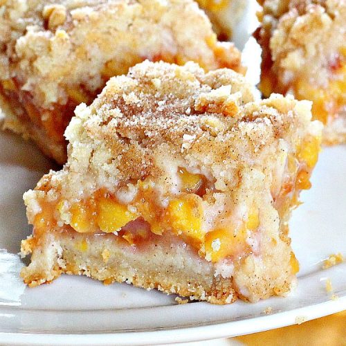Peach Crumb Bars | Can't Stay Out of the Kitchen | these fabulous #dessert bars are some of the best with #peaches I've ever eaten. The #streusel topping with #cinnamon sugar just melts in your mouth. We loved these #cookies.