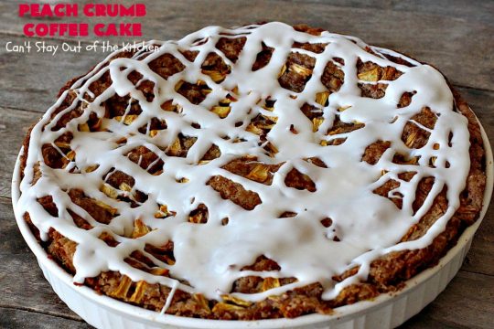 Peach Crumb Coffee Cake | Can't Stay Out of the Kitchen | this scrumptious coffee #cake is filled with #peaches, has a #cinnamon & brown sugar streusel, then it's glazed with powdered sugar icing. It's terrific either as a #breakfast #coffeecake for #holidays like #Thanksgiving or #Christmas or serve as a #dessert. #peachcake #peachdessert #CANbassador #WashingtonStateFruitCommission #WashingtonStateStoneFruitGrowers