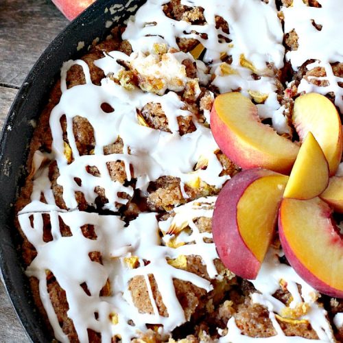 Peach Crumb Coffee Cake | Can't Stay Out of the Kitchen | this scrumptious coffee #cake is filled with #peaches, has a #cinnamon & brown sugar streusel, then it's glazed with powdered sugar icing. It's terrific either as a #breakfast #coffeecake for #holidays like #Thanksgiving or #Christmas or serve as a #dessert. #peachcake #peachdessert #CANbassador #WashingtonStateFruitCommission #WashingtonStateStoneFruitGrowers