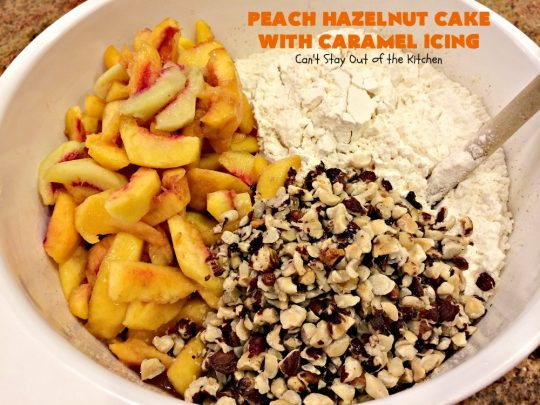 Peach Hazelnut Cake with Caramel Icing | Can't Stay Out of the Kitchen | in this fantastic #cake the #caramel icing sinks into the cake like a #pokecake. It's absolutely spectacular & the perfect #summer #dessert. #peaches #hazelnuts