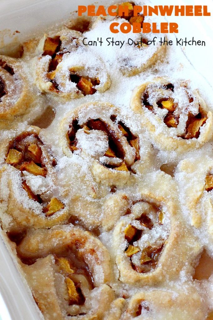 Peach Pinwheel Cobbler | Can't Stay Out of the Kitchen | this is one fantastic #PeachCobbler! #Peaches are wrapped up in dough pinwheel fashion. Syrup is poured over top before baking. The pinwheels absorb the syrup & puff up really large. This is absolutely heavenly. Wonderful #summer #dessert. #PeachDessert #cobbler #PeachPinwheelCobbler #Canbassador #WashingtonStateFruitCommission #WashingtonStoneFruitGrowers #WashingtonStateStoneFruitGrowers