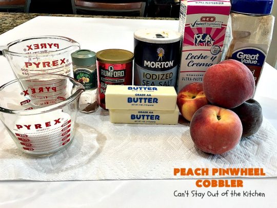 Peach Pinwheel Cobbler | Can't Stay Out of the Kitchen | this is one fantastic #PeachCobbler! #Peaches are wrapped up in dough pinwheel fashion. Syrup is poured over top before baking. The pinwheels absorb the syrup & puff up really large. This is absolutely heavenly. Wonderful #summer #dessert. #PeachDessert #cobbler #PeachPinwheelCobbler #Canbassador #WashingtonStateFruitCommission #WashingtonStoneFruitGrowers #WashingtonStateStoneFruitGrowers