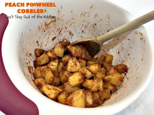 Peach Pinwheel Cobbler | Can't Stay Out of the Kitchen | this is one fantastic #PeachCobbler! #Peaches are wrapped up in dough pinwheel fashion. Syrup is poured over top before baking. The pinwheels absorb the syrup & puff up really large. This is absolutely heavenly. Wonderful #summer #dessert. #PeachDessert #cobbler #PeachPinwheelCobbler #Canbassador #WashingtonStateFruitCommission #WashingtonStoneFruitGrowers #WashingtonStateStoneFruitGrowers