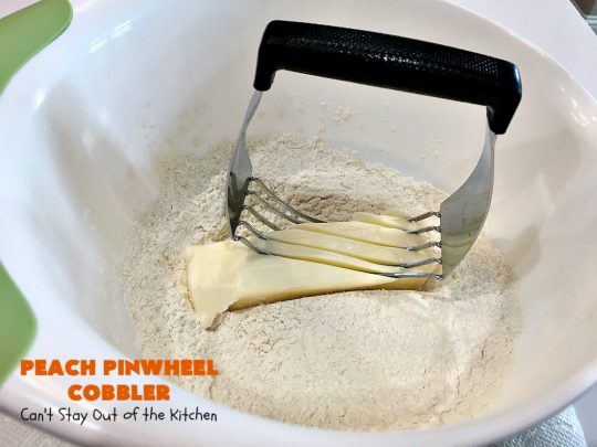 Peach Pinwheel Cobbler | Can't Stay Out of the Kitchen | this is one fantastic #PeachCobbler! #Peaches are wrapped up in dough pinwheel fashion. Syrup is poured over top before baking. The pinwheels absorb the syrup & puff up really large. This is absolutely heavenly. Wonderful #summer #dessert. #PeachDessert #cobbler #PeachPinwheelCobbler #Canbassador #WashingtonStateFruitCommission #WashingtonStoneFruitGrowers #WashingtonStateStoneFruitGrowers