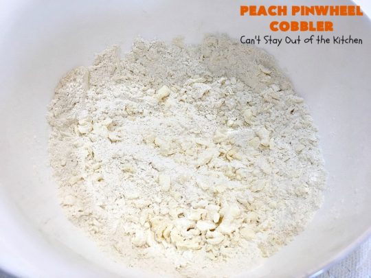 Peach Pinwheel Cobbler | Can't Stay Out of the Kitchen | this is one fantastic #PeachCobbler! #Peaches are wrapped up in dough pinwheel fashion. Syrup is poured over top before baking. The pinwheels absorb the syrup & puff up really large. This is absolutely heavenly. Wonderful #summer #dessert. #PeachDessert #cobbler #PeachPinwheelCobbler #Canbassador #WashingtonStateFruitCommission #WashingtonStoneFruitGrowers #WashingtonStateStoneFruitGrowers