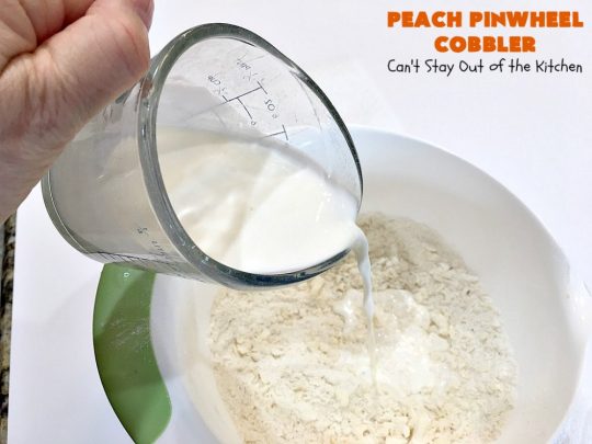 Peach Pinwheel Cobbler | Can't Stay Out of the Kitchen | this is one fantastic #PeachCobbler! #Peaches are wrapped up in dough pinwheel fashion. Syrup is poured over top before baking. The pinwheels absorb the syrup & puff up really large. This is absolutely heavenly. Wonderful #summer #dessert. #PeachDessert #cobbler #PeachPinwheelCobbler #Canbassador #WashingtonStateFruitCommission #WashingtonStoneFruitGrowers #WashingtonStateStoneFruitGrowers