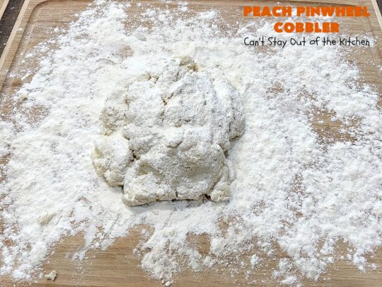 Peach Pinwheel Cobbler | Can't Stay Out of the Kitchen | this is one fantastic #PeachCobbler! #Peaches are wrapped up in dough pinwheel fashion. Syrup is poured over top before baking. The pinwheels absorb the syrup & puff up really large. This is absolutely heavenly. Wonderful #summer #dessert. #PeachDessert #cobbler #PeachPinwheelCobbler #Canbassador #WashingtonStateFruitCommission #WashingtonStoneFruitGrowers #WashingtonStateStoneFruitGrowers