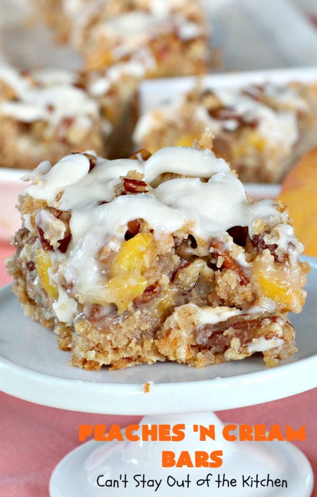Peaches 'n Cream Bars | Can't Stay Out of the Kitchen | these fabulous #cookies have an #oatmeal #streusel crust, a #peach filling & they're glazed with vanilla icing. This is a terrific #dessert for summer #holidays like #FourthofJuly & #LaborDay when #peaches are in season. We loved them.