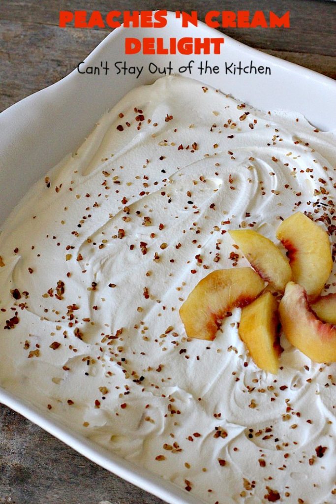 Peaches 'n Cream Delight| Can't Stay Out of the Kitchen | this lovely #cheesecake #dessert is absolutely heavenly. It has has a scrumptious layer of fresh #peaches in the middle that pops with flavor. Terrific for #company or #holiday menus. #peachdessert #CANbassador #WashingtonStateFruitCommission #WashingtonStateStoneFruitGrowers
