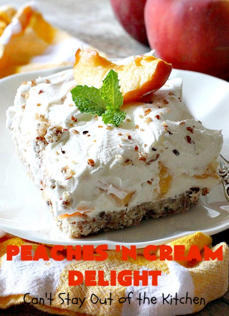 Peaches 'n Cream Delight| Can't Stay Out of the Kitchen | this lovely #cheesecake #dessert is absolutely heavenly. It has has a scrumptious layer of fresh #peaches in the middle that pops with flavor. Terrific for #company or #holiday menus. #peachdessert #CANbassador #WashingtonStateFruitCommission #WashingtonStateStoneFruitGrowers
