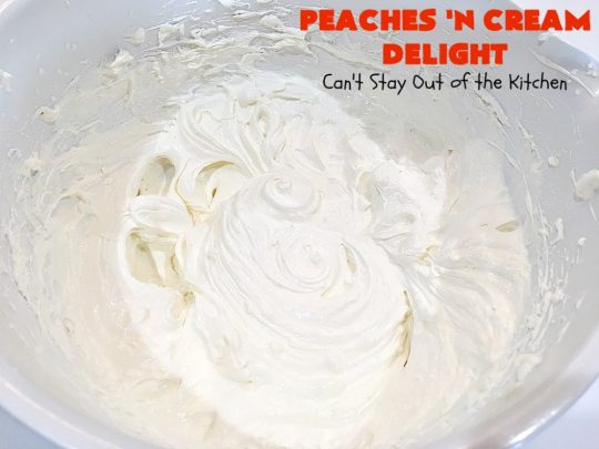 Peaches 'n Cream Delight| Can't Stay Out of the Kitchen | this lovely #cheesecake #dessert is absolutely heavenly. It has has a scrumptious layer of fresh #peaches in the middle that pops with flavor. Terrific for #company or #holiday menus. #peachdessert #CANbassador #WashingtonStateFruitCommission #WashingtonStateStoneFruitGrowers