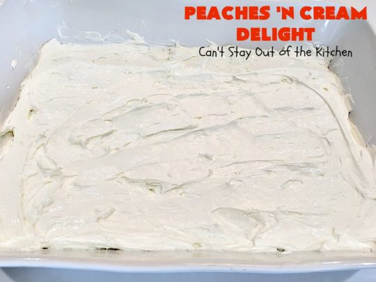 Peaches 'n Cream Delight| Can't Stay Out of the Kitchen | this lovely #cheesecake #dessert is absolutely heavenly. It has has a scrumptious layer of fresh #peaches in the middle that pops with flavor. Terrific for #company or #holiday menus. #peachdessert #CANbassador #WashingtonStateFruitCommission #WashingtonStateStoneFruitGrowers