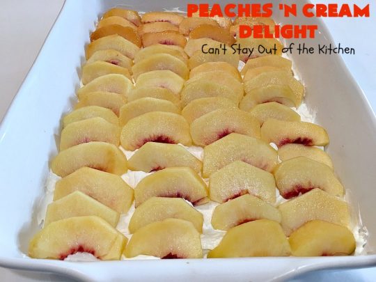 Peaches 'n Cream Delight| Can't Stay Out of the Kitchen | this lovely #cheesecake #dessert is absolutely heavenly. It has has a scrumptious layer of fresh #peaches in the middle that pops with flavor. Terrific for #company or #holiday menus. #peachdessert #CANbassador #WashingtonStateFruitCommission #WashingtonStateStoneFruitGrowers