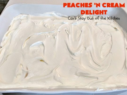 Peaches 'n Cream Delight| Can't Stay Out of the Kitchen | this lovely #cheesecake #dessert is absolutely heavenly. It has has a scrumptious layer of fresh #peaches in the middle that pops with flavor. Terrific for #company or #holiday menus. #peachdessert #CANbassador #WashingtonStateFruitCommission #WashingtonStateStoneFruitGrowers