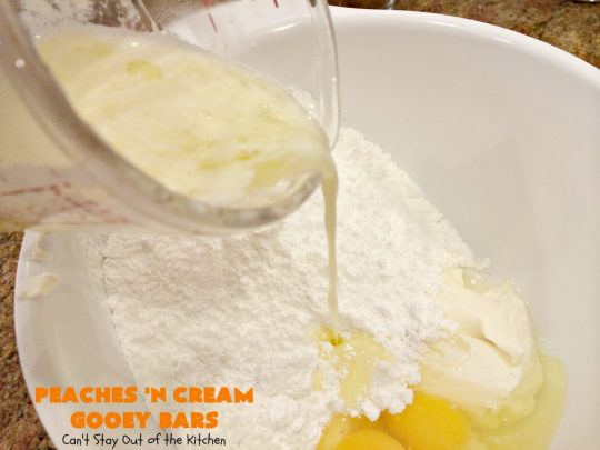 Peaches 'n Cream Gooey Bars | Can't Stay Out of the Kitchen | these ooey, gooey blondies are absolutely divine! They're filled with #cheesecake filling & topped with fresh #peaches & #cinnamon-sugar. Perfect for summer #holiday menus like #FathersDay #MemorialDay & #FourthofJuly. #dessert