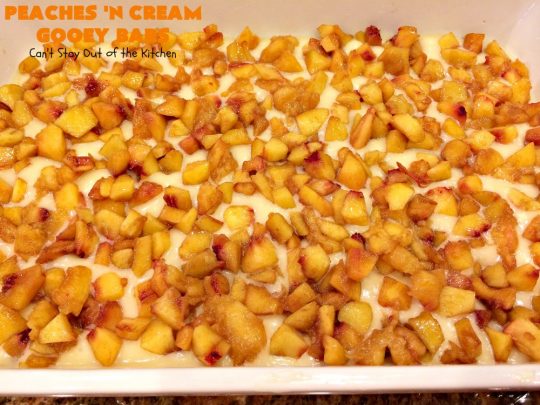 Peaches 'n Cream Gooey Bars | Can't Stay Out of the Kitchen | these ooey, gooey blondies are absolutely divine! They're filled with #cheesecake filling & topped with fresh #peaches & #cinnamon-sugar. Perfect for summer #holiday menus like #FathersDay #MemorialDay & #FourthofJuly. #dessert
