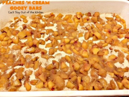 Peaches 'n Cream Gooey Bars | Can't Stay Out of the Kitchen | these ooey, gooey blondies are absolutely divine! They're filled with #cheesecake filling & topped with fresh #peaches & #cinnamon-sugar. Perfect for summer #holiday menus like #FathersDay #MemorialDay & #FourthofJuly. #dessert