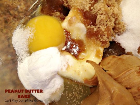 Peanut Butter Bars | Can't Stay Out of the Kitchen | Get your #chocolate fix & #PeanutButter fix with one delicious #recipe! This #dessert is sure to get your motor going as every bite is rich, decadent and heavenly. #cookie #ChocolateChips #PeanutButterDessert #brownie #tailgating #ChocolateDessert #FathersDayDessert #FourthOfJulyDessert