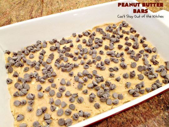 Peanut Butter Bars | Can't Stay Out of the Kitchen | Get your #chocolate fix & #PeanutButter fix with one delicious #recipe! This #dessert is sure to get your motor going as every bite is rich, decadent and heavenly. #cookie #ChocolateChips #PeanutButterDessert #brownie #tailgating #ChocolateDessert #FathersDayDessert #FourthOfJulyDessert