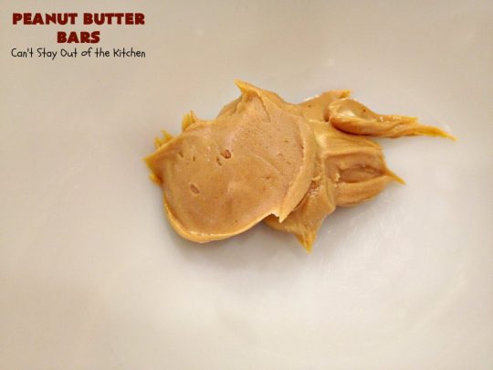 Peanut Butter Bars | Can't Stay Out of the Kitchen | Get your #chocolate fix & #PeanutButter fix with one delicious #recipe! This #dessert is sure to get your motor going as every bite is rich, decadent and heavenly. #cookie #ChocolateChips #PeanutButterDessert #brownie #tailgating #ChocolateDessert #FathersDayDessert #FourthOfJulyDessert