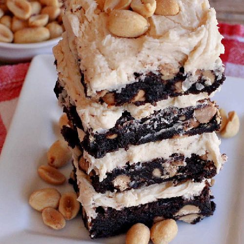 Peanut Butter Brownies | Can't Stay Out of the Kitchen | these luscious #brownies start with a brownie mix & #PeanutButterChips. The #PeanutButter & #CreamCheese Icing is to die for. If you enjoy #chocolate & peanut butter #desserts, you'll love this one. #tailgating #cookies #holiday #HolidayDessert #ChocolateDessert #PeanutButterDessert #ChristmasCookieExchange #PeanutButterBrownies