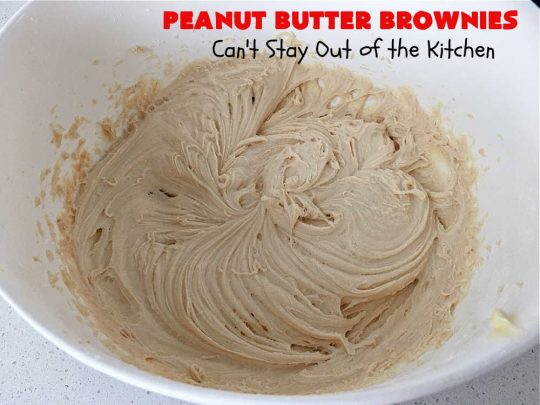 Peanut Butter Brownies | Can't Stay Out of the Kitchen | these luscious #brownies start with a brownie mix & #PeanutButterChips. The #PeanutButter & #CreamCheese Icing is to die for. If you enjoy #chocolate & peanut butter #desserts, you'll love this one. #tailgating #cookies #holiday #HolidayDessert #ChocolateDessert #PeanutButterDessert #ChristmasCookieExchange #PeanutButterBrownies
