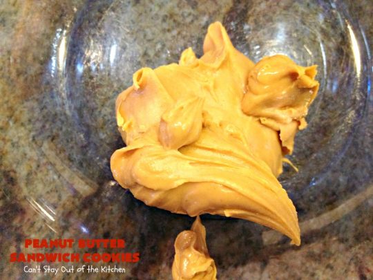 Peanut Butter Sandwich Cookies | Can't Stay Out of the Kitchen | these #cookies are irresistible. They're filled with #PeanutButter plus they have a luscious peanut butter frosting in the middle. They're so mouthwatering you won't be able to stop eating them! Great for #tailgating parties, birthdays or grilling out with friends. #dessert #PeanutButterCookies #PeanutButterSandwichCookies #southern #PeanutButterDessert #FavoritePeanutButterCookies