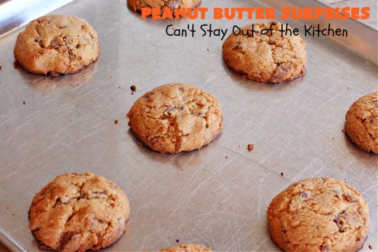 Peanut Butter Surprises | Can't Stay Out of the Kitchen | Surprise your family with these amazing #cookies. They're chocked full of #PeanutButter & #ReesesPeanutButterCups. Every bite will rock your world! Great for #tailgating or #holiday parties. #chocolate #dessert #ChocolateDessert #PeanutButterDessert #HolidayDessert #ReesesPeanutButterCupsDessert #PeanutButterSurprises