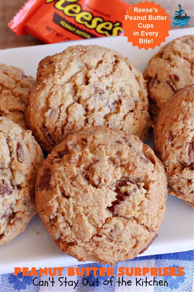 Peanut Butter Surprises | Can't Stay Out of the Kitchen | Surprise your family with these amazing #cookies. They're chocked full of #PeanutButter & #ReesesPeanutButterCups. Every bite will rock your world! Great for #tailgating or #holiday parties. #chocolate #dessert #ChocolateDessert #PeanutButterDessert #HolidayDessert #ReesesPeanutButterCupsDessert #PeanutButterSurprises