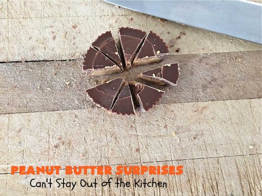 Peanut Butter Surprises | Can't Stay Out of the Kitchen | Surprise your family with these amazing #cookies. They're chocked full of #PeanutButter & #ReesesPeanutButterCups. Every bite will rock your world! Great for #tailgating or #holiday parties. #chocolate #dessert #ChocolateDessert #PeanutButterDessert #HolidayDessert #ReesesPeanutButterCupsDessert #PeanutButterSurprises
