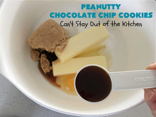 Peanutty Chocolate Chip Cookies | Can't Stay Out of the Kitchen | these luscious #cookies are filled with miniature #ChocolateChips & #RoastedPeanuts. They're both crunchy & chewy with soft insides. Excellent for #tailgating parties, potlucks, backyard BBQs & a #ChristmasCookieExchange. #holiday #HolidayDessert #ChocolateDessert #PeanutButterDessert #dessert #chocolate #PeanuttyChocolateChipCookies