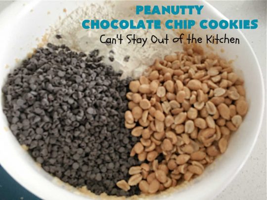 Peanutty Chocolate Chip Cookies | Can't Stay Out of the Kitchen | these luscious #cookies are filled with miniature #ChocolateChips & #RoastedPeanuts. They're both crunchy & chewy with soft insides. Excellent for #tailgating parties, potlucks, backyard BBQs & a #ChristmasCookieExchange. #holiday #HolidayDessert #ChocolateDessert #PeanutButterDessert #dessert #chocolate #PeanuttyChocolateChipCookies