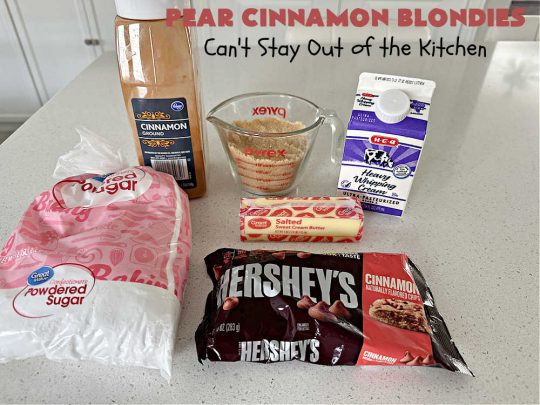Pear Cinnamon Blondies | Can't Stay Out of the Kitchen | these luscious #blondies are very sweet, rich, decadent & heavenly. The bars include #bananas & #pears to keep them moist, #walnuts & #CinnamonChips to add texture & sweetness. They also have a fantastic #BrownedButterIcing on top with more #cinnamon chips to add even more decadence. Excellent for any kind of potluck or #holiday activity. Every bite will rock your world! #PearCinnamonBlondies