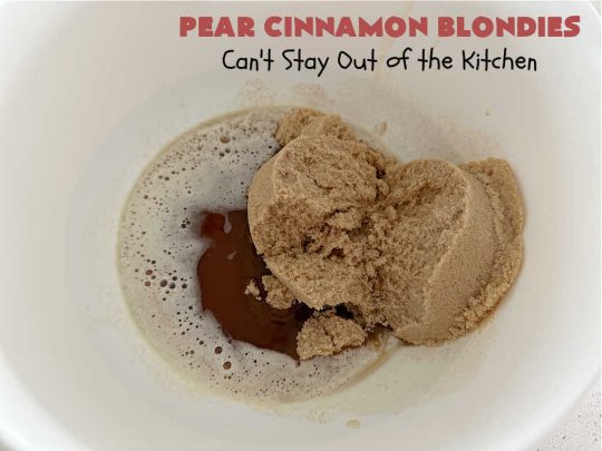 Pear Cinnamon Blondies | Can't Stay Out of the Kitchen | these luscious #blondies are very sweet, rich, decadent & heavenly. The bars include #bananas & #pears to keep them moist, #walnuts & #CinnamonChips to add texture & sweetness. They also have a fantastic #BrownedButterIcing on top with more #cinnamon chips to add even more decadence. Excellent for any kind of potluck or #holiday activity. Every bite will rock your world! #PearCinnamonBlondies
