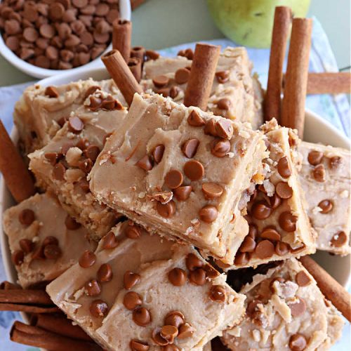 Pear Cinnamon Blondies | Can't Stay Out of the Kitchen | these luscious #blondies are very sweet, rich, decadent & heavenly. The bars include #bananas & #pears to keep them moist, #walnuts & #CinnamonChips to add texture & sweetness. They also have a fantastic #BrownedButterIcing on top with more #cinnamon chips to add even more decadence. Excellent for any kind of potluck or #holiday activity. Every bite will rock your world! #PearCinnamonBlondies