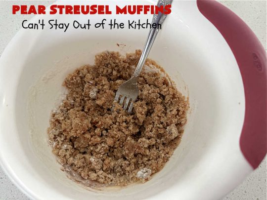 Pear Streusel Muffins | Can't Stay Out of the Kitchen | these spectacular #muffins are filled with #pears, & #yogurt to keep them moist. Spices like #cloves, #cinnamon & #allspice amp up the flavors without overwhelming the muffins. The #StreuselTopping provides texture & the glaze a little more sweetness to make these muffins a drool-worthy experience! Great for a weekend, company or #holiday #breakfast. #PearStreuselMuffins