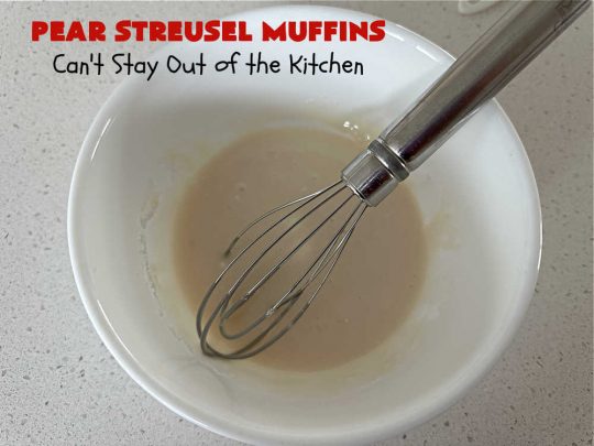 Pear Streusel Muffins | Can't Stay Out of the Kitchen | these spectacular #muffins are filled with #pears, & #yogurt to keep them moist. Spices like #cloves, #cinnamon & #allspice amp up the flavors without overwhelming the muffins. The #StreuselTopping provides texture & the glaze a little more sweetness to make these muffins a drool-worthy experience! Great for a weekend, company or #holiday #breakfast. #PearStreuselMuffins