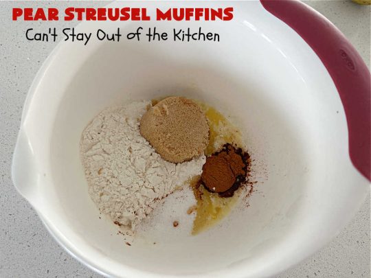 Pear Streusel Muffins | Can't Stay Out of the Kitchen | these spectacular #muffins are filled with #pears, & #yogurt to keep them moist. Spices like #cloves, #cinnamon & #allspice amp up the flavors without overwhelming the muffins. The #StreuselTopping provides texture & the glaze a little more sweetness to make these muffins a drool-worthy experience! Great for a weekend, company or #holiday #breakfast. #PearStreuselMuffins