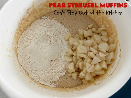 Pear Streusel Muffins | Can't Stay Out of the Kitchen | these spectacular #muffins are filled with #pears, & #yogurt to keep them moist. Spices like #cloves, #cinnamon & #allspice amp up the flavors without overwhelming the muffins. The #StreuselTopping provides texture & the glaze a little more sweetness to make these muffins a drool-worthy experience! Great for a weekend, company or #holiday #breakfast. #PearStreuselMuffins
