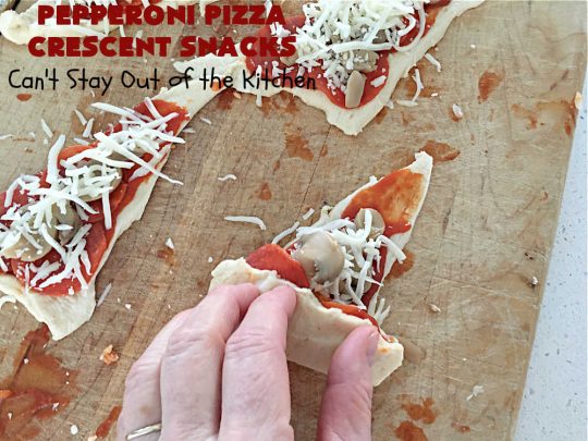 Pepperoni Pizza Crescent Snacks | Can't Stay Out of the Kitchen | fantastic 5-ingredient #GooseberryPatch #recipe is marvelous for #NewYearsEve, #NewYearsDay or #SuperBowl celebrations. This amazing #appetizer will knock your socks off! #pepperoni #pizza #mushrooms #MozzarellaCheese #PepperoniPizza #PepperoniPizzaCrescentSnacks
