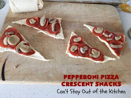 Pepperoni Pizza Crescent Snacks | Can't Stay Out of the Kitchen | fantastic 5-ingredient #GooseberryPatch #recipe is marvelous for #NewYearsEve, #NewYearsDay or #SuperBowl celebrations. This amazing #appetizer will knock your socks off! #pepperoni #pizza #mushrooms #MozzarellaCheese #PepperoniPizza #PepperoniPizzaCrescentSnacks