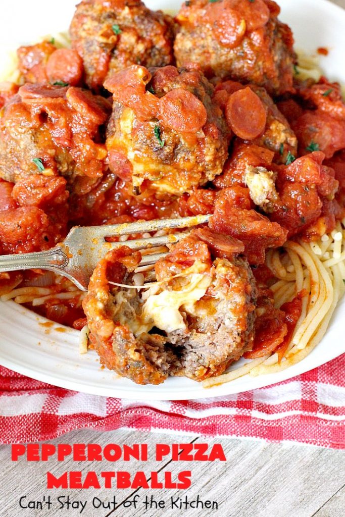 Pepperoni Pizza Meatballs | Can't Stay Out of the Kitchen | This is like eating #PepperoniPizza but in #meatball form! These fabulous #meatballs are stuffed with #pepperoni & #mozzarella cheese cubes. The #marinara sauce also includes pepperoni. Absolutely mouthwatering. #pasta #glutenfree